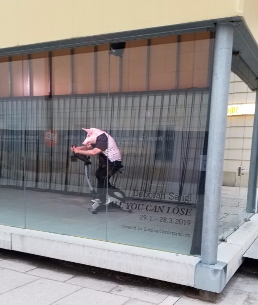 "All You Can Lose," a public art piece by Deborah Sengl in the MQ Art Box in the MuseumQuartier.