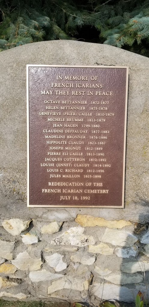 A plaque at the Icarian Cemetery, listing the names of individuals known to be buried there.